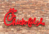 Chick-fil-A Locks Doors, Doubles Down on THIS! Chick-fil-A restaurant sign on a stone wall