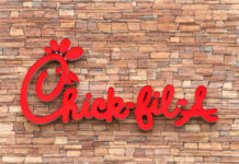Chick-fil-A Locks Doors, Doubles Down on THIS! Chick-fil-A restaurant sign on a stone wall