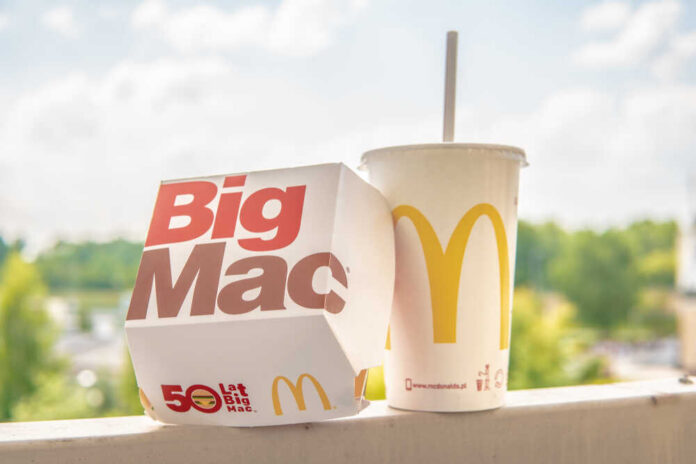 Warsaw,,Poland,,July,22,,2018,Mcdonald's,Big,Mac,With,Two A Big Mac box next to a McDonald's drink cup on a ledge