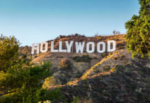 Beloved TV Dad Gone — Fans Saddened Hollywood Sign on a green hillside, sunny day.
