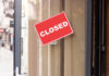 Small Towns Brace: 175 Stores Axed A red 'CLOSED' sign hanging on a storefront door