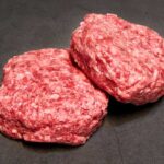 Ground beef on display at a butcher shop.