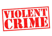 Chicago Carnage: 19 Shot, 6 Dead Red stamp with the words VIOLENT CRIME