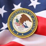 Weaponized DOJ? Dem Governor Lights The Fuse Department of Justice seal on an American flag background