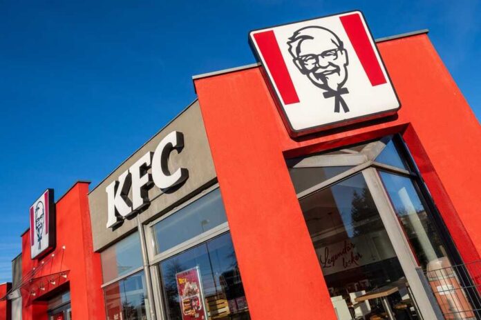 Exterior view of a KFC restaurant with its iconic logo