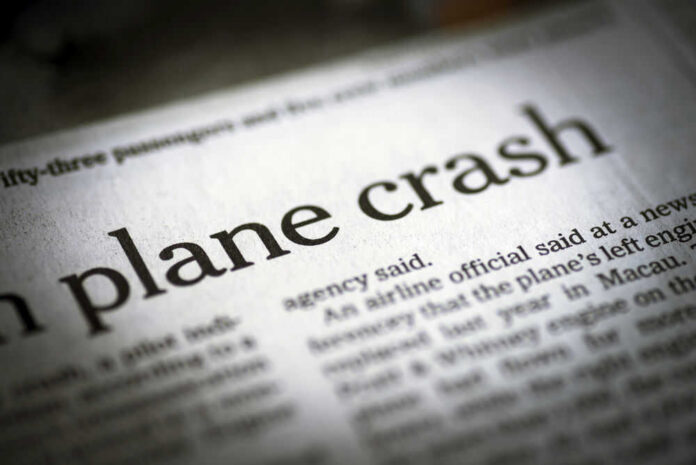 shutterstock_290501621 Newspaper headline about a plane crash.