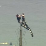 Empire State Stunt Turns FELONY Protest & Proposal Atop Empire State Building