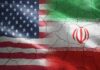 American Blood Spills — What Did Iran Hit? Flags of the United States and Iran blended together with a cracked texture