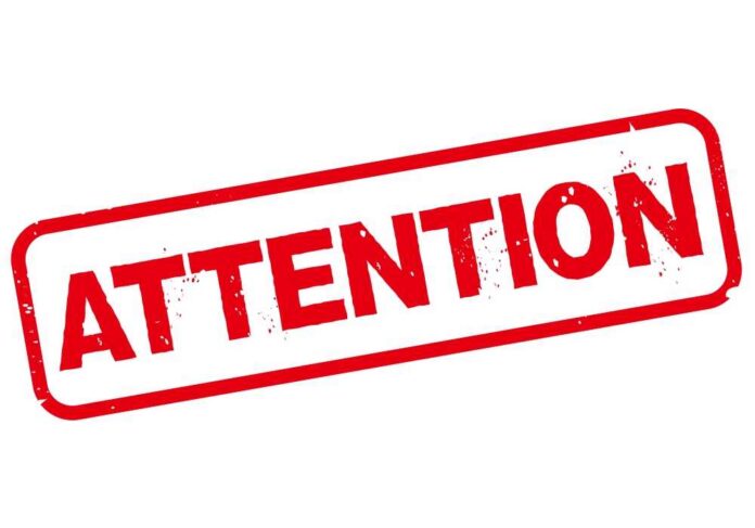 Red stamp with the word 'ATTENTION' in bold letters
