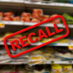 Allergy Time Bomb In Cookie Aisle? Recall notice over grocery store shelves.