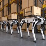 China’s Robot Dogs Blocked — Here’s Why Human and robot interacting with virtual screen.