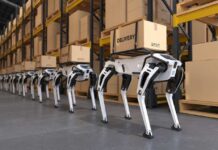 China’s Robot Dogs Blocked — Here’s Why Human and robot interacting with virtual screen.