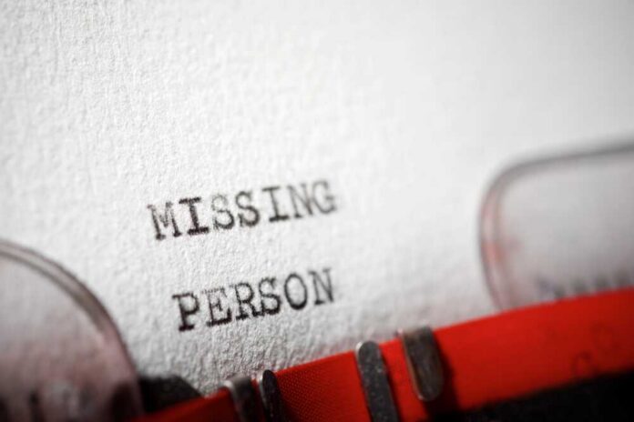 Missing,Person,Text,Written,With,A,Typewriter. Close-up of a typewritten document with the words 'MISSING PERSON'