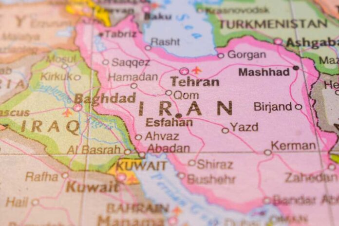 Iran,On,The,World,Map,Colorful,Geo,Political,World,Map Map highlighting Iran and surrounding countries in the Middle East