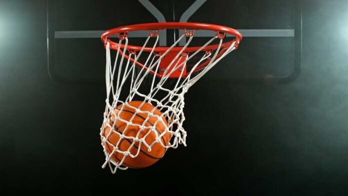 Detail,Of,Basketball,Ball,Hitting,The,Hoop,,Top,View.,Isolated Basketball swishing through a hoop