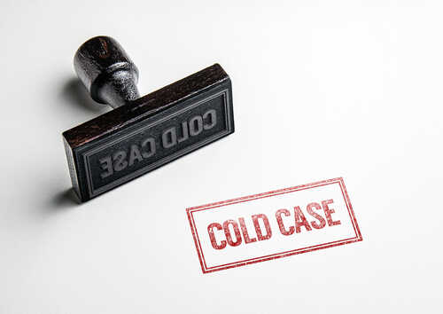 Rubber,Stamping,That,Says,'cold,Case'. Rubber stamp with the words COLD CASE next to a stamped impression