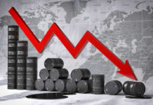 America’s Oil Backstop Thin — Next Shock Looms? Graph depicting a decline in oil prices with barrels in the foreground