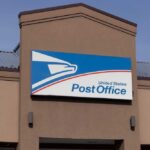 United States post office sign on a building facade