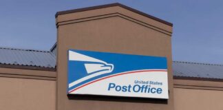 United States post office sign on a building facade