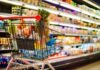 Shredded Lettuce Triggers Historic Outbreak Shopping cart filled with various groceries in a supermarket aisle