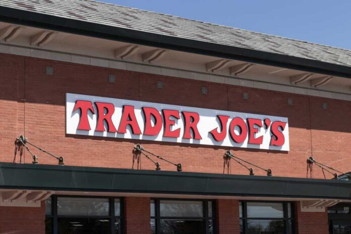 Grocery store exterior with red brick facade and large sign