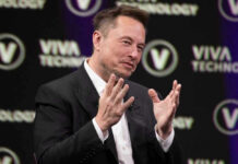 Musk’s $100M Gambit Scrambles Midterms Elon Musk on stage at Viva Technology conference.