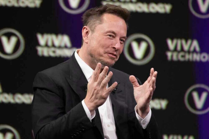 shutterstock_2318800315 Elon Musk on stage at Viva Technology conference.