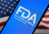 FDA Flags Walmart Soup — Toss It FDA logo on smartphone American flag background
