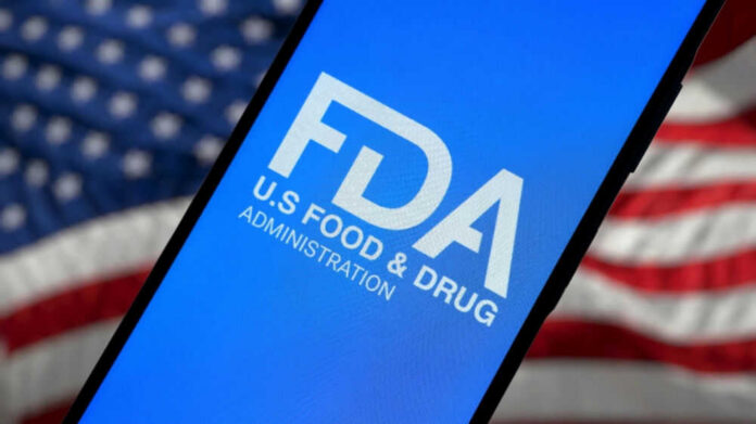 shutterstock_2593746281 FDA logo on smartphone American flag background