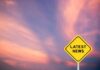 TikTok Star’s Final Post Stuns Millions Yellow diamond sign reading latest news against a colorful sunset sky