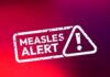 Deadly Measles Returns to State Measles alert warning sign with exclamation mark