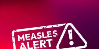 Measles alert warning sign with exclamation mark