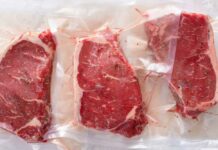 Beef Crunch Slams Consumers — Plants Axed Three vacuum sealed steaks on a white surface