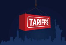 NOW: Tariff TIT-FOR-TAT Ignites Red shipping container labeled 'TARIFFS' suspended above a city skyline