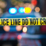 VIDEO: Deadly Nightmare Unfolds In Suburban Home Police tape and lights at crime scene.