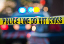 VIDEO: Deadly Nightmare Unfolds In Suburban Home Police tape and lights at crime scene.
