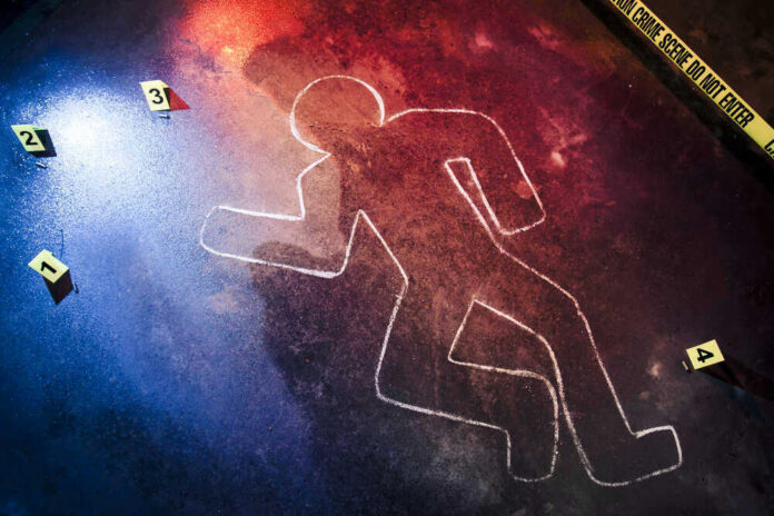 shutterstock_93961822 Crime scene chalk outline with numbered evidence markers.