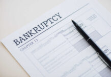 Bankruptcy Bombshell: Pro Sport Collapse Bankruptcy Chapter 13 form with a pen resting on it