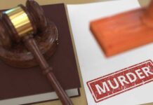 Judge's gavel on a law book beside a stamped document