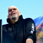 VIDEO: Fetterman Backs Trump At GOP Convention John Fetterman speaking at podium.