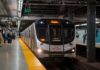 Subway train arriving at an underground platform