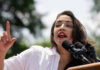 AOC’s Big Move After Midterms? Alexandria Ocasio-Cortez speaking at an outdoor event.