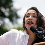 AOC’s Big Move After Midterms? Alexandria Ocasio-Cortez speaking at an outdoor event.