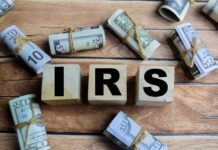 NEWS ALERT: IRS Cash Match Hits Millions Wooden blocks spelling IRS surrounded by rolled currency notes