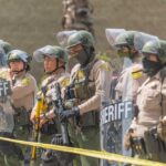 Congress Shock: Boebert Name in Felony Storm Dontrelle Inman and Danny White among sheriff deputies in riot gear holding shields