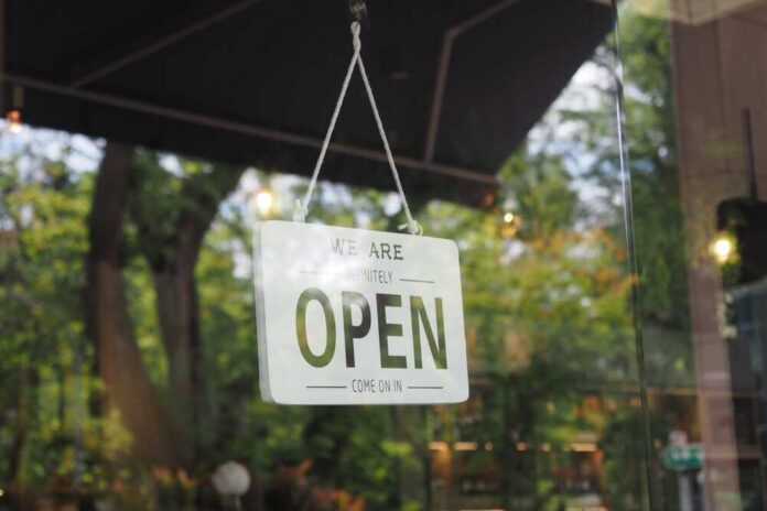 Sign,Indicating,Business,Is,Open,For,Customers