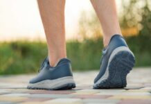10,000 Steps? Marketing Myth Exposed Two individuals walking on a path during sunset