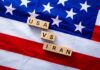 VIDEO: U.S. Turns Iran’s Tankers Into Targets Wood letter blocks on an American flag