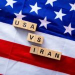 VIDEO: U.S. Turns Iran’s Tankers Into Targets Wood letter blocks on an American flag