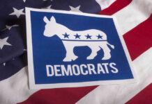 Democrats Ditch Ballot – New Move Shocks GOP Democratic Party donkey logo on American flag background.